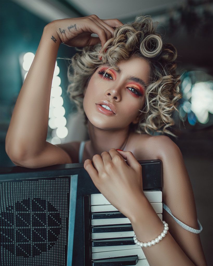 female model posing with a keyboard